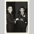 Man handing out award to Shuch Yamamoto (ddr-jamsj-1-639)