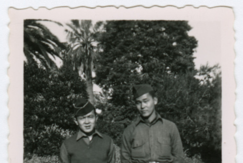 Two soldiers standing on garden path (ddr-densho-368-233)