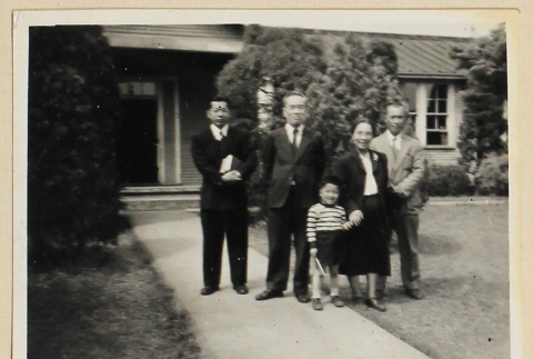 Family outside a house (ddr-densho-433-735)