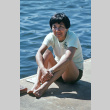 Edith Tanaka sitting on the dock (ddr-densho-336-1141)