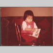 Girl with book (ddr-densho-523-507)