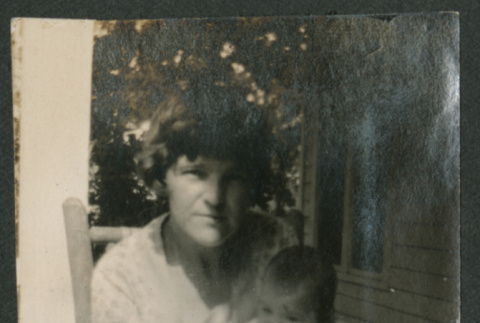 woman and baby in rocking chair (ddr-densho-378-700)