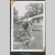 Man playing guitar (ddr-densho-434-249)