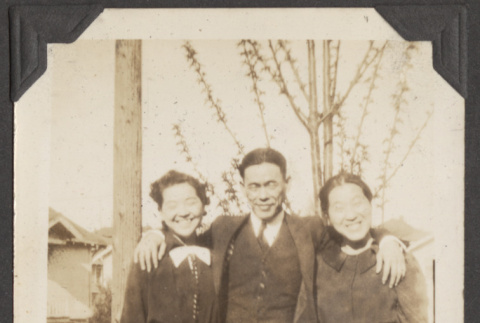 Two women and a man standing outside (ddr-densho-432-44)