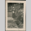 Woman standing in garden (ddr-densho-523-101)