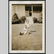 Woman and child recline on lawn (ddr-densho-359-390)