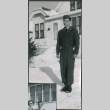 Man in uniform in snow (ddr-densho-523-235)