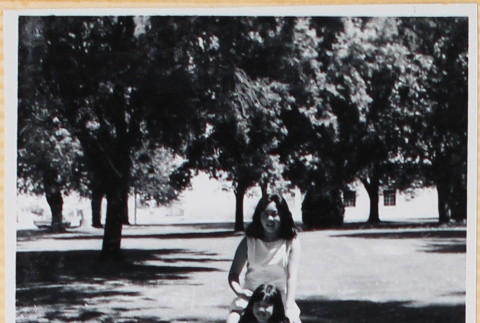 Two girls playing on lawn (ddr-densho-522-115)