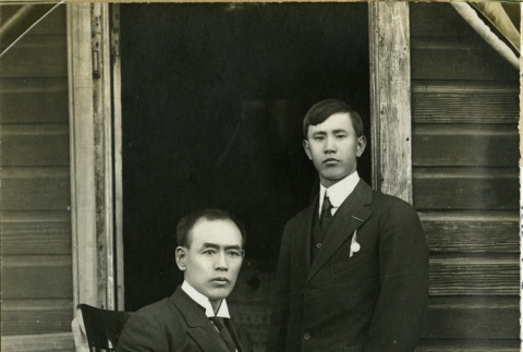 Issei man and son in front of home (ddr-densho-113-28)