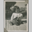 Toddler sitting on a deck (ddr-densho-201-985)