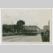 Soldiers marching by through city street (ddr-densho-368-91)