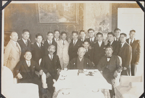Group of men around table (ddr-densho-326-129)