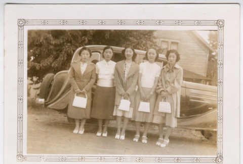 Five women in front of a car (ddr-densho-313-32)