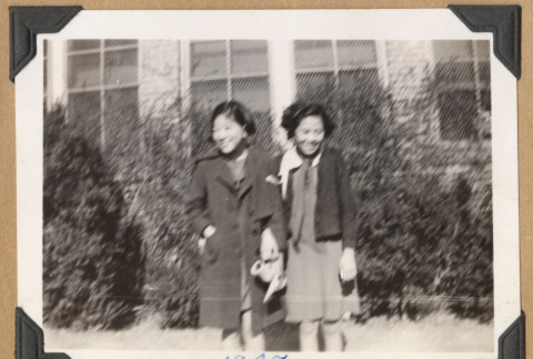 Smiling girls holding hands (ddr-densho-542-186)