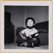 William Shiomi with toy rifle (ddr-densho-522-187)