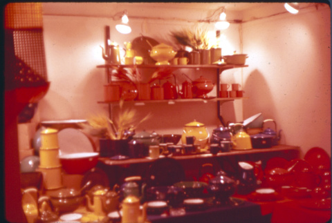 Display of enamel and lacquerware kitchen products (ddr-densho-426-326)