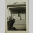 Young girl on the porch (ddr-densho-258-147)
