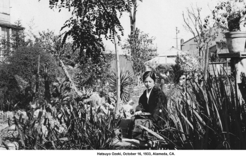 Hatsuyo Ozeki seated in garden (ddr-ajah-6-830)