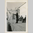Dr. Jones stands at a microphone (ddr-densho-37-961)