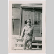 Man in uniform standing outside barracks (ddr-ajah-2-6)