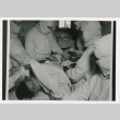 Person undergoing medical procedure (ddr-densho-1007-184)