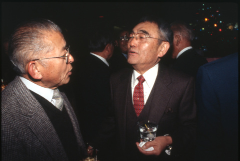 Two men talking (ddr-densho-1007-752)