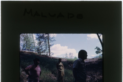 A woman and two men at the Malavade project (ddr-densho-377-1106)