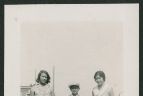 Three people outside (ddr-densho-378-859)