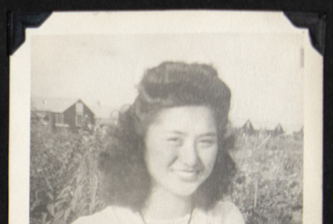Woman beside a garden (ddr-densho-542-756)