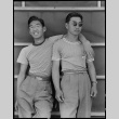 Japanese Americans outside barracks (ddr-densho-151-3)