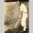 Hiroshi Saito posing with a golf club (ddr-njpa-4-2514)