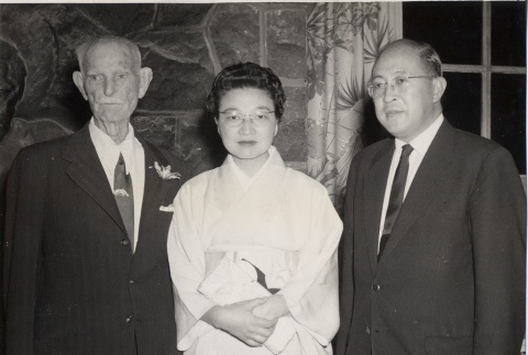 Two men and a woman wearing a kimono (ddr-njpa-2-638)