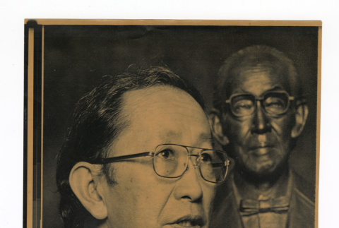 Archie Miyatake in front of a bust of his father, Toyo, who documented life at Manzanar through photographs (ddr-csujad-52-43)