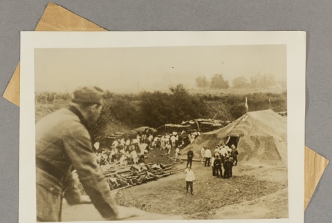 People in front of a tent (ddr-njpa-13-1642)