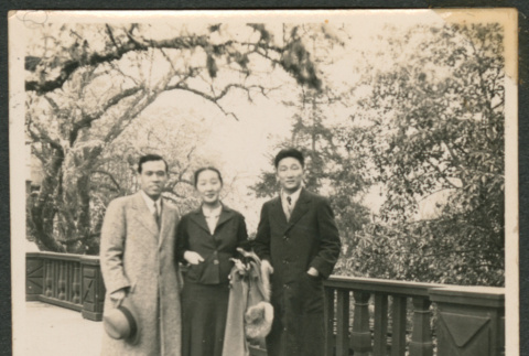 Three people in winter coats (ddr-densho-433-782)