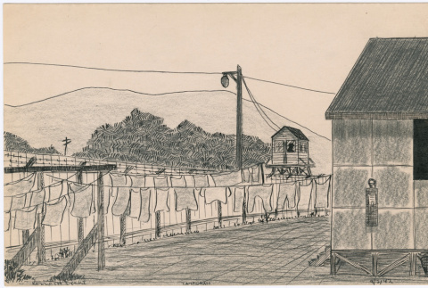 Laundry lines and a guard tower at Tanforan Assembly Center (ddr-densho-392-44)