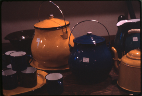 Display of enamelware pots and cups (ddr-densho-426-348)