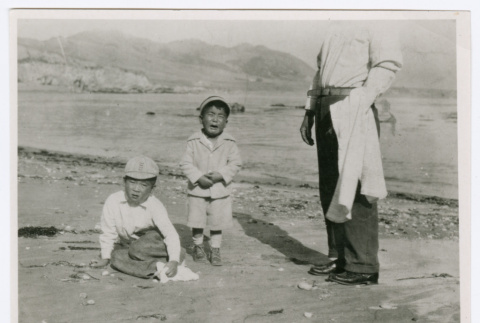 Susumu and Tory Miyoshi at beach (ddr-densho-480-159)
