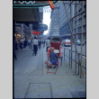Man and rickshaw on sidewalk by Victoria Hotel (ddr-densho-426-743)
