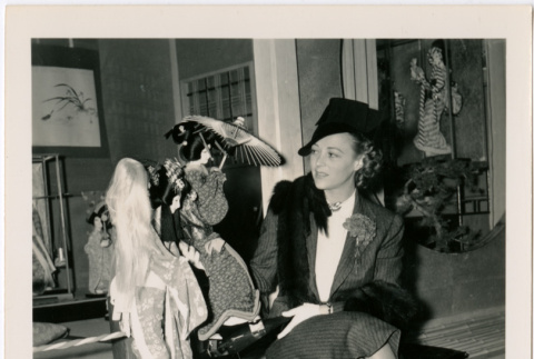 Woman seated with Japanese dolls (ddr-densho-426-1114)