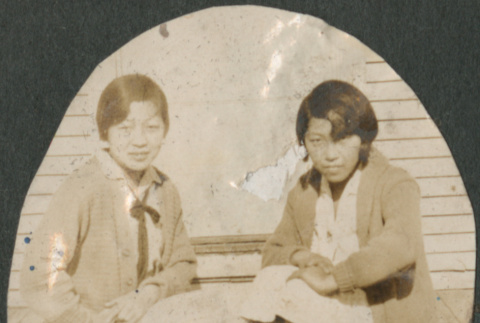 Two women sitting on steps (ddr-densho-316-381)