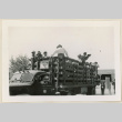 Cotton pickers waiting to leave (ddr-densho-37-948)