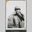 Man making face for camera (ddr-densho-434-321)