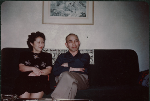 Couple pose on the couch (ddr-densho-359-1124)
