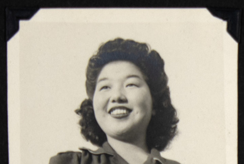 Portrait of a smiling woman (ddr-densho-542-658)