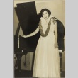 Madge Goto standing next to a piano (ddr-njpa-5-1147)