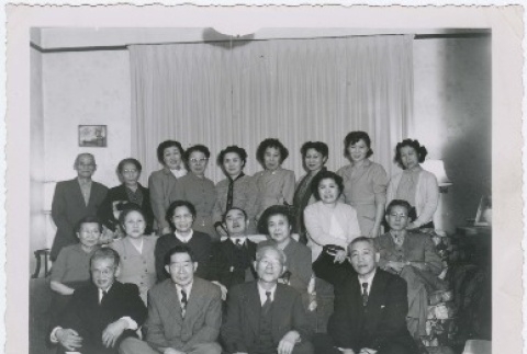 Men and women seated and standing in room (ddr-densho-330-292)