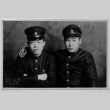 Two servicepeople with arms around each other (ddr-densho-1007-48)