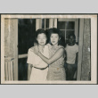 Two women, with man standing in background (ddr-densho-316-410)