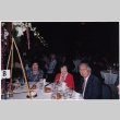 Martha Suzuki, Tomoye and Henri Takahashi seated at a table (ddr-densho-426-453)